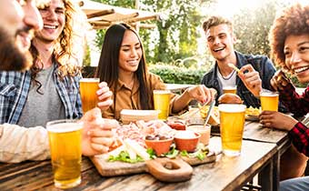people drinking beer at table